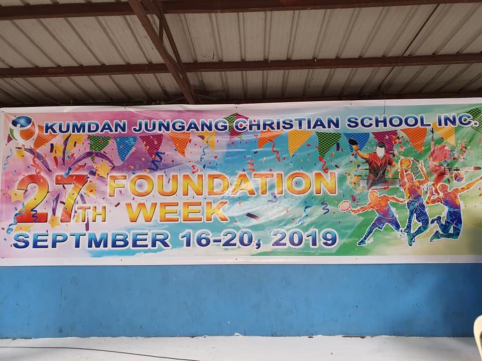 Foundation Day banner on the school grounds