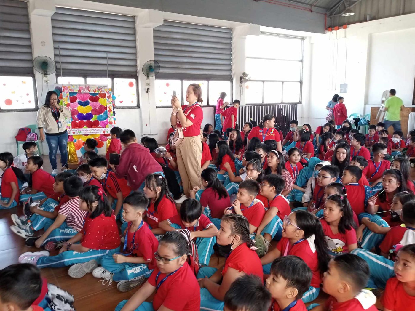 Pupils seated for the Valentine's Day programme