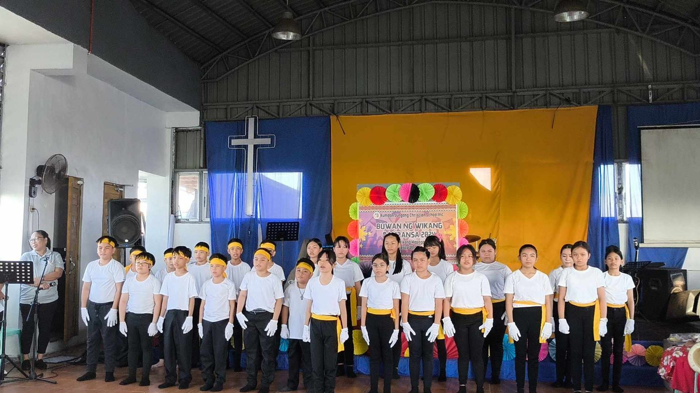 Elementary pupils performing at a Buwan ng Wika programme